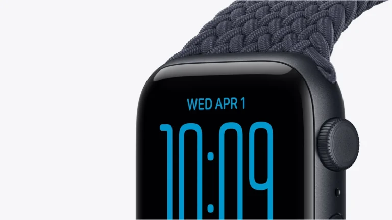 Midnight Apple Watch SE 3 with a dark braided band, showing the Digital Crown and 10:09 in blue digits