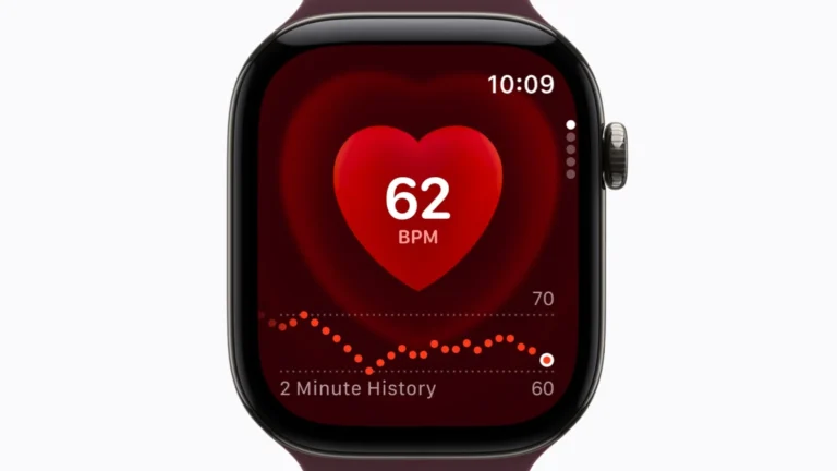 Apple Watch Series 12 Heart Rate app showing 62 BPM inside a red heart above a two-minute history chart