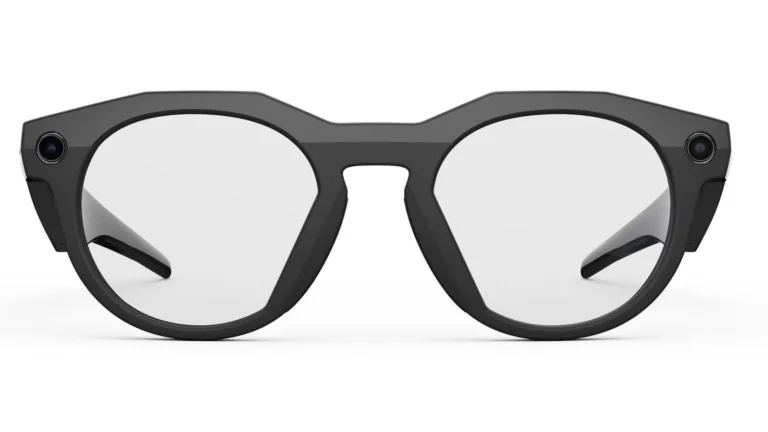 Front view of the black Oakley Meta HSTN with clear lenses, showing the camera lens in the left corner of the frame and the capture LED in the right corner