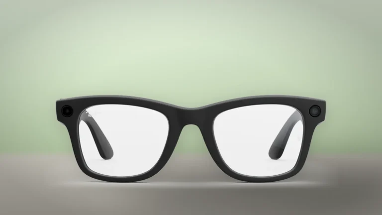 Front view of the Ray-Ban Meta Wayfarer Gen 2 in matte black with clear lenses, a round module at each upper corner