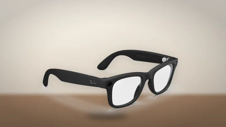 Ray-Ban Meta Wayfarer Gen 2 in matte black with clear lenses, seen from the right front, the camera at the corner of the frame
