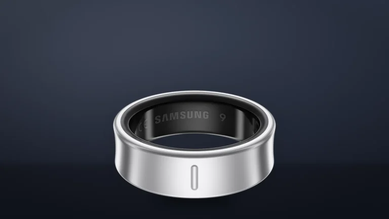 Galaxy Ring in Titanium Silver from above, showing the raised orientation mark on the outer face and the Samsung lettering inside